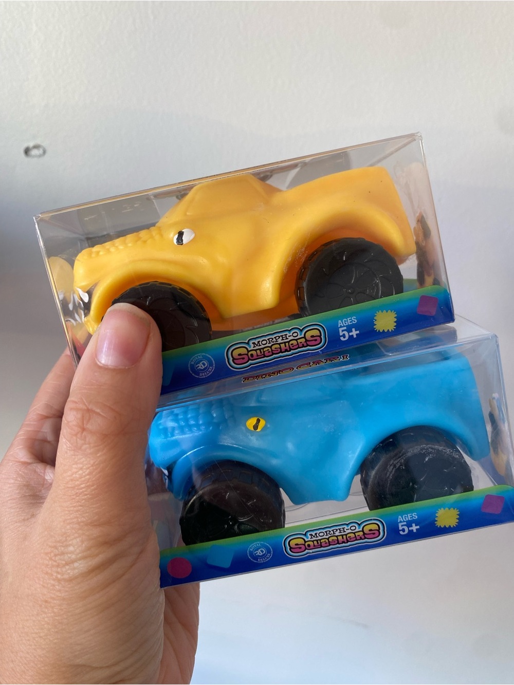 MorphO Squashers Dino Truck Squishy Lot of 2 Blue Yellow